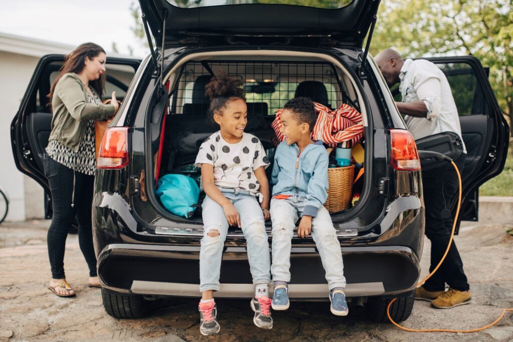 family with electric vehicle